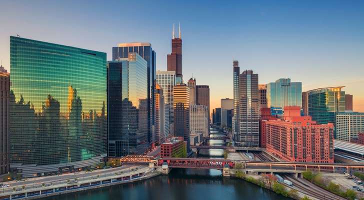 &copy; RudyBalasko/iStock/Getty Images Plus Cityscape of Downtown Chicago at sunrise