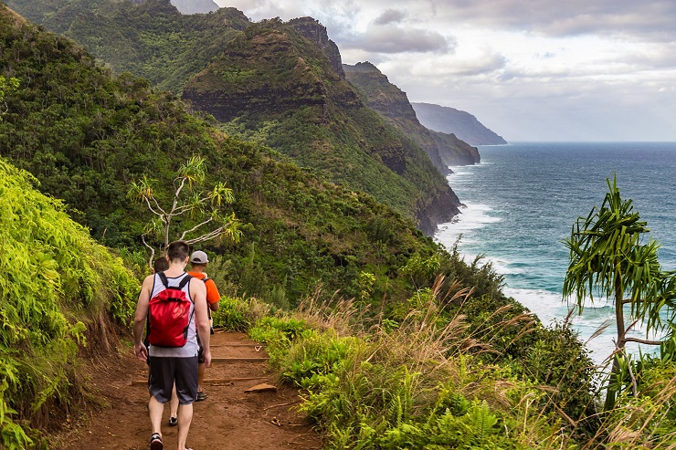 Hikers on the Kalalau Trail on the Na Pali Coast of Kauai &copy; Alexander Howard/Lonely Planet