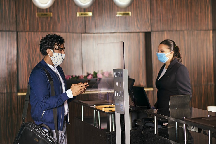 During the check in process, all staff and guests are required to use masks, hand gloves and sanitisers. &copy;Hyatt