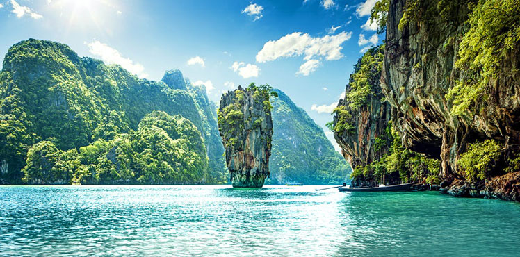 Limestone karst mountains at James Bond Island in Phang Nga Bay &copy; mikolajn / Shutterstock