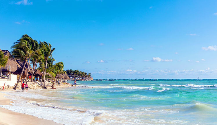 Enjoy working near the beach at the relaxed Mexican town of Playa del Carmen &copy; PJPHOTO / Alamy Stock Photos