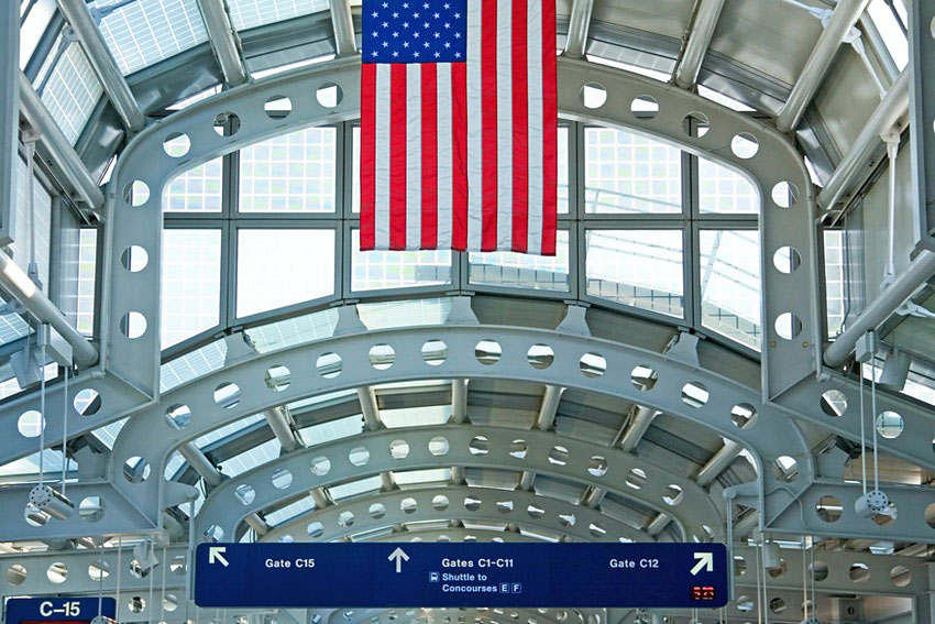 The US is considering more stringent testing measures for travelers to tackle the new Omicron strain of COVID-19 &copy; Getty Images